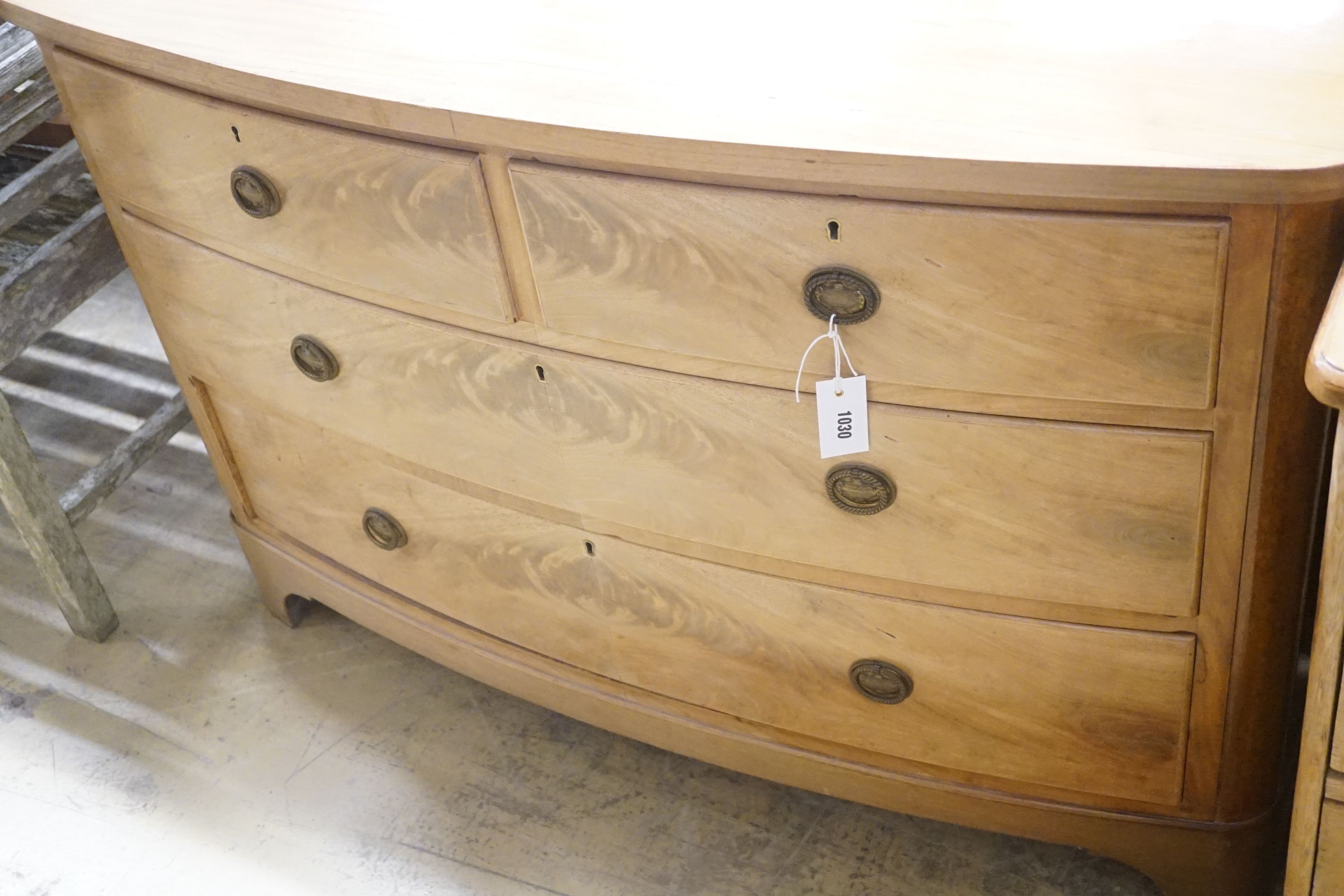 A Regency faded mahogany bow-front chest of three long drawers, width 120cm depth 51cm height 77cm